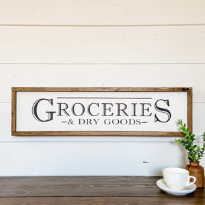 Handcrafted farmhouse style wood sign that reads "Groceries & Dry Goods"  Edit alt text