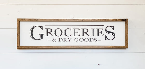 Handcrafted farmhouse style wood sign that reads "Groceries & Dry Goods"