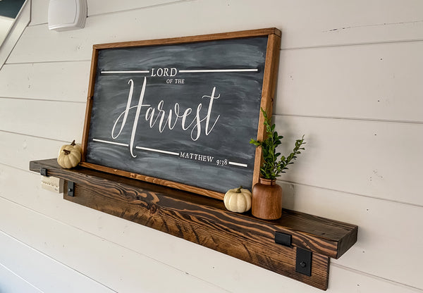 Farmhouse style wood sign with Matthew 9:38 scripture painted on it