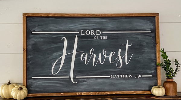 Farmhouse style wood sign with Matthew 9:38 scripture painted on it