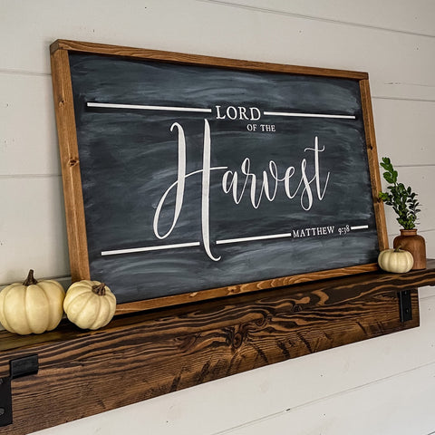 Farmhouse style wood sign with Matthew 9:38 scripture painted on it