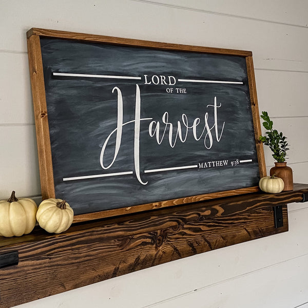 Farmhouse style wood sign with Matthew 9:38 scripture painted on it