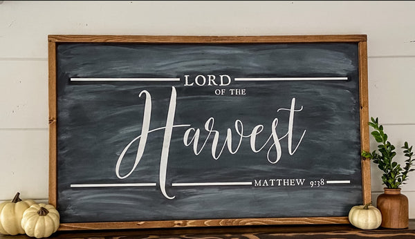 Farmhouse style wood sign with Matthew 9:38 scripture painted on it