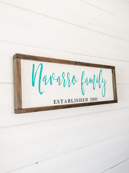 Handcrafted farmhouse style wood sign with family name and established date