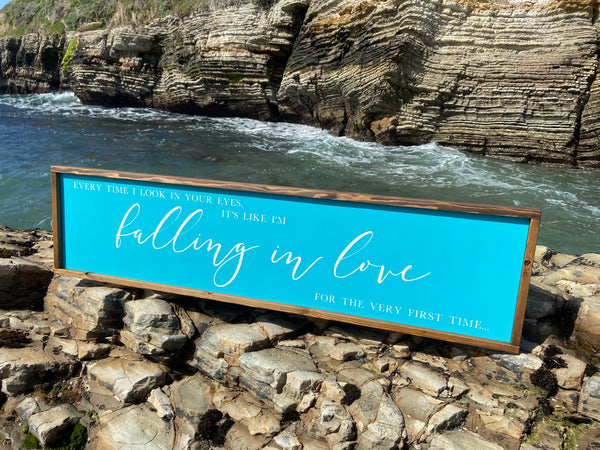 Handcrafted farmhouse style wood sign with lyrics from a love song