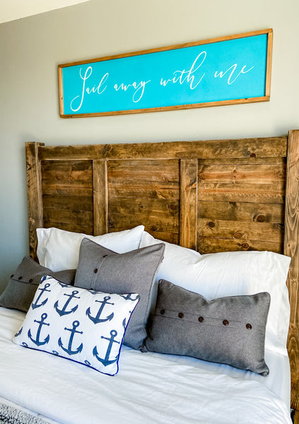 Handcrafted farmhouse style wood sign that reads "Sail away with me"